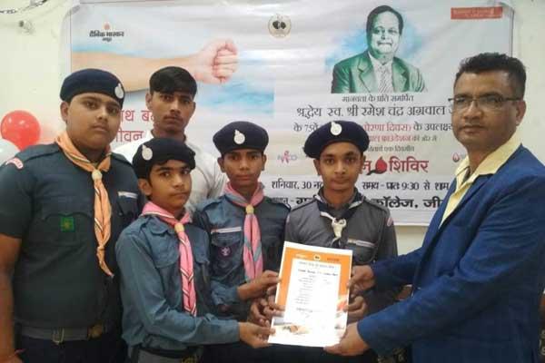 Scouts of MVM JIND are being honored in blood donation Camp by Sh. Krishan Middha M. L. A. Jind for best social services